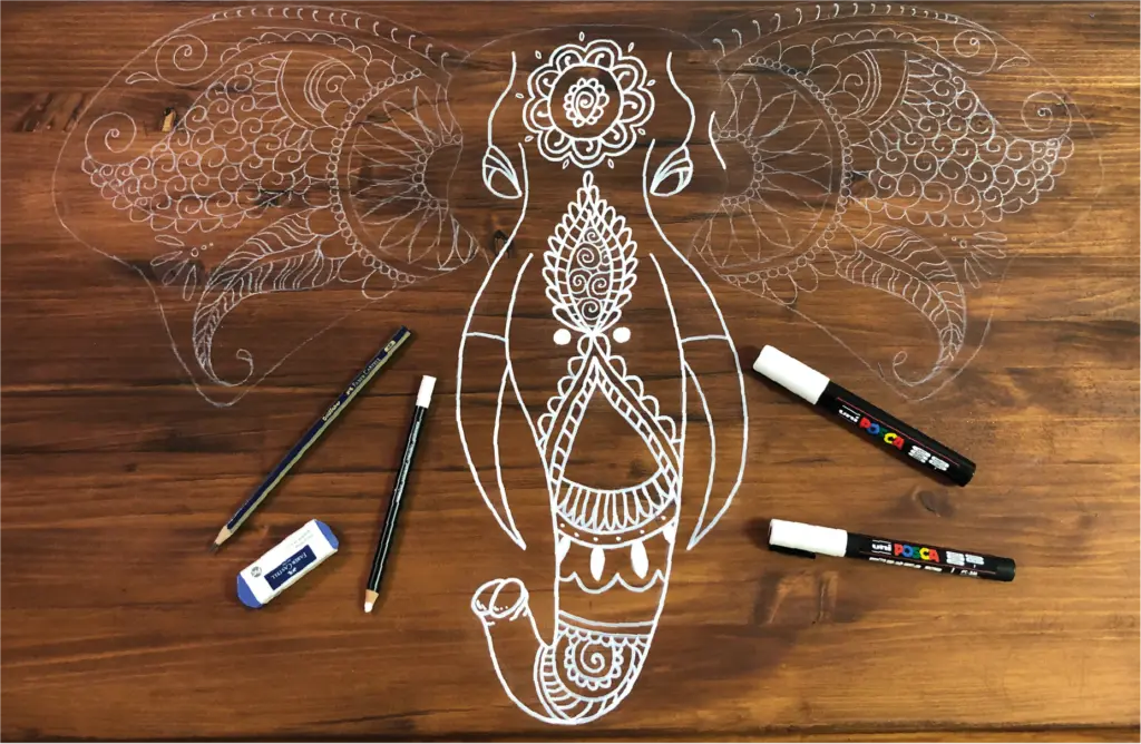 hand drawn artwork on wood furniture